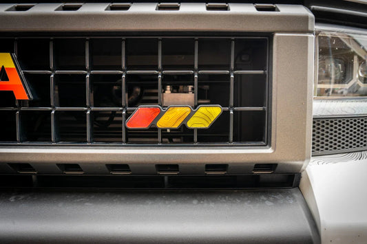 Tri Color Topographic Grille Emblem - 2024+ Land Cruiser / 2016-2013 Tacoma - SFB24LCTRIBAR-TRD- DRIVEN - 2