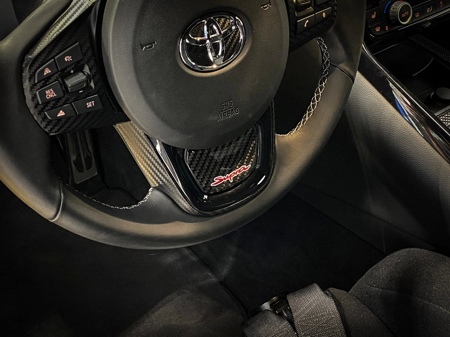 Real Carbon "Supra" Steering Wheel Trim Overlay (Lower) - 2020+ Supra - A90CFSTRWHL- DRIVEN - 3