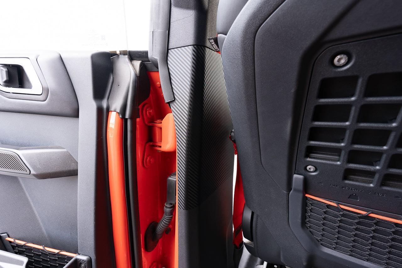 3D Carbon Seatbelt Trim Protector - 2021+ Bronco 4 Door - 21BRNSEATPRO-3DB-  DRIVEN - 5