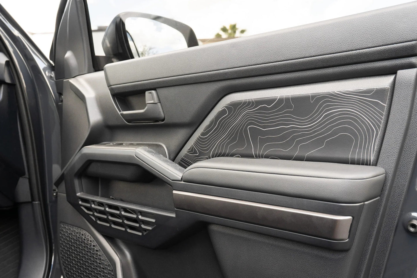 Topographic Front Door Armrest Panel Protection - 2024+ Tacoma / 2025+ 4Runner - 254RUNNER-SB-TP.WH-254RUNNER-SB-TP.JA-254RUNNER-SB-TP.HB-254RUNNER-SB-TP.VB-254RUNNER-SB-TP.AG-  DRIVEN - 1