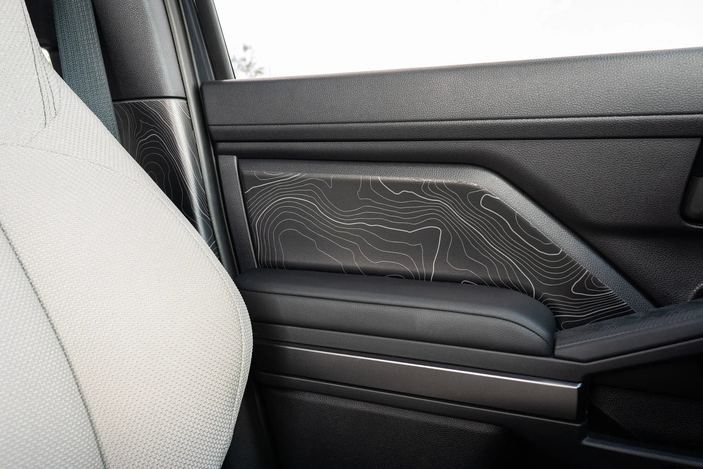 Topographic Front Door Armrest Panel Protection - 2024+ Tacoma / 2025+ 4Runner - 254RUNNER-SB-TP.WH-254RUNNER-SB-TP.JA-254RUNNER-SB-TP.HB-254RUNNER-SB-TP.VB-254RUNNER-SB-TP.AG-  DRIVEN - 5