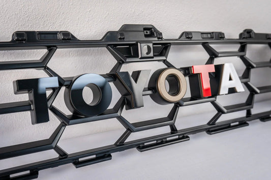 TOYOTA Front Grille Acrylic Emblem Overlays - 2025+ 4Runner TRD Pro / Trailhunter - 254RUNNER-FTPTH-AC-WH-254RUNNER-FTPTH-AC-GB-254RUNNER-FTPTH-AC-MB-254RUNNER-FTPTH-AC-OR-254RUNNER-FTPTH-AC-RD-  DRIVEN - 1