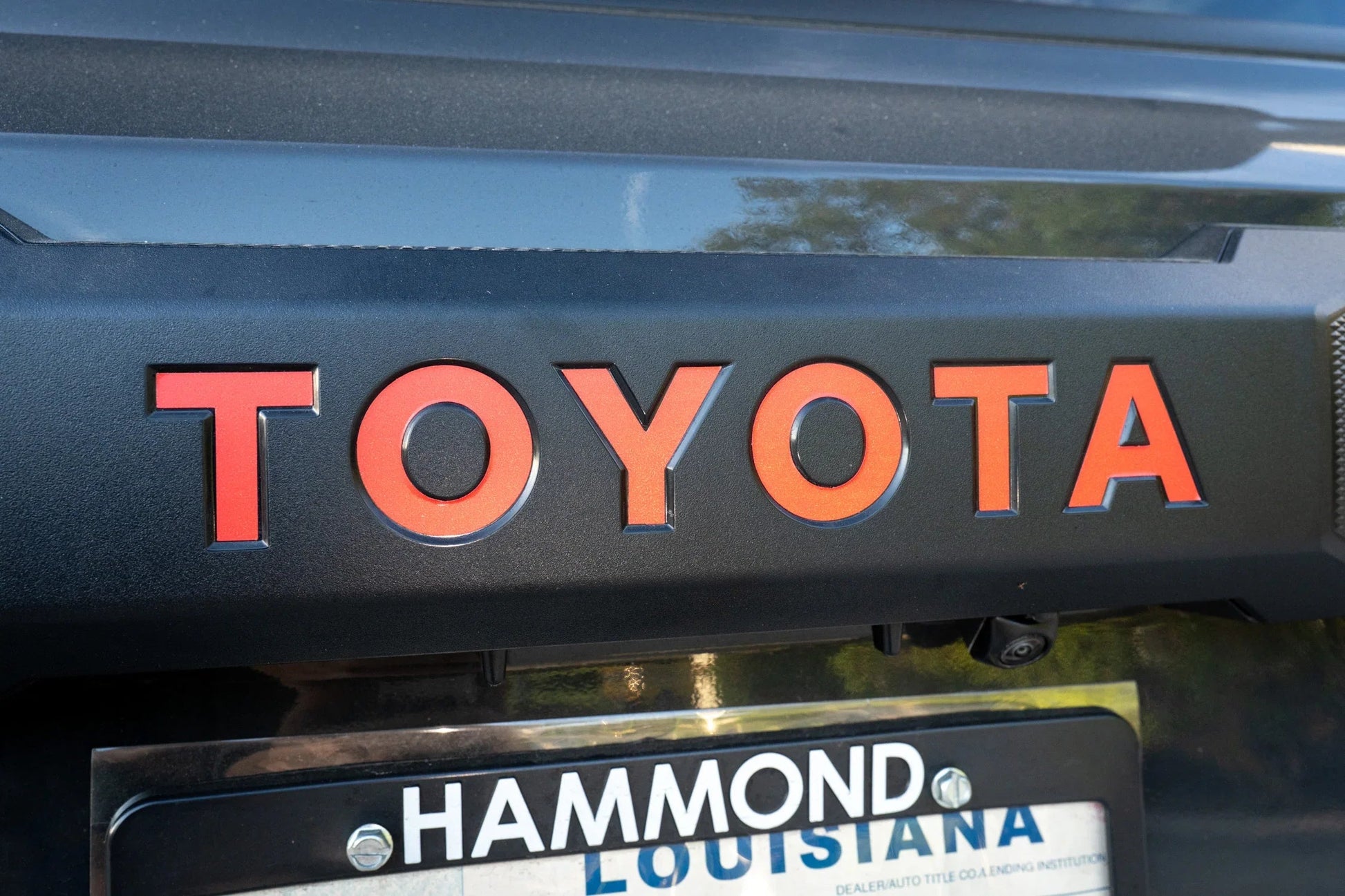 TOYOTA Emergency Reflective Rear Hatch Liftgate Emblem Overlays - 2025+ 4Runner - 24LC250-RTE-TOYOTA-WH-24LC250-RTE-TOYOTA-MB-24LC250-RTE-TOYOTA-BL-24LC250-RTE-TOYOTA-OR-24LC250-RTE-TOYOTA-PI-  DRIVEN - 1