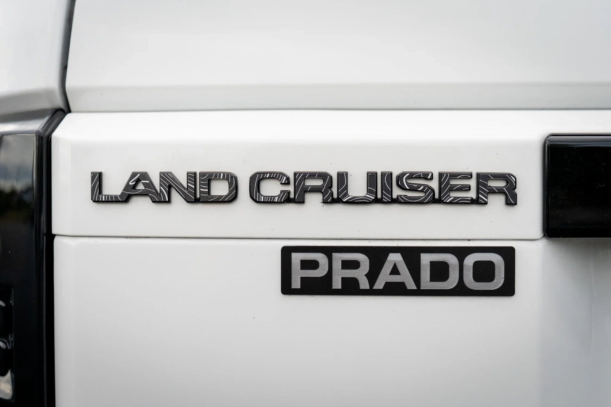 "Land Cruiser" Topographic Rear Tailgate Emblem Overlays - 2024+ Land Cruiser - 24LC250-RT-LC-TPWH-24LC250-RT-LC-TPHB-24LC250-RT-LC-TPVB-24LC250-RT-LC-TPAG-24LC250-RT-LC-TPSO-  DRIVEN - 3