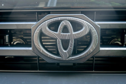 Front OEM Cover Topographic Overlays - *2024+ Tacoma / *2025+ 4Runner - 24LC250-RT-TOYOTA-TPWH-24LC250-RT-TOYOTA-TPHB-24LC250-RT-TOYOTA-TPVB-24LC250-RT-TOYOTA-TPAG-24LC250-RT-TOYOTA-TPSO-  DRIVEN - 8