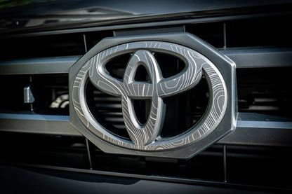 Front OEM Cover Topographic Overlays - *2024+ Tacoma / *2025+ 4Runner - 24LC250-RT-TOYOTA-TPWH-24LC250-RT-TOYOTA-TPHB-24LC250-RT-TOYOTA-TPVB-24LC250-RT-TOYOTA-TPAG-24LC250-RT-TOYOTA-TPSO-  DRIVEN - 1