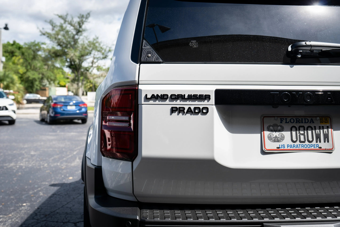 Black Prado Emblem - 2024+ Land Cruiser - 24LC250-PRADOR-  DRIVEN - 1