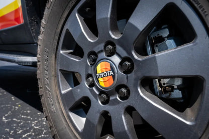 OEM Wheel Cap Overlays - 2024+ Land Cruiser / Tacoma / 2025+ 4Runner - 24LANDCRUISERWC-TYHER-24LANDCRUISERWC-WHBKM-24LANDCRUISERWC-BKM-  DRIVEN - 1
