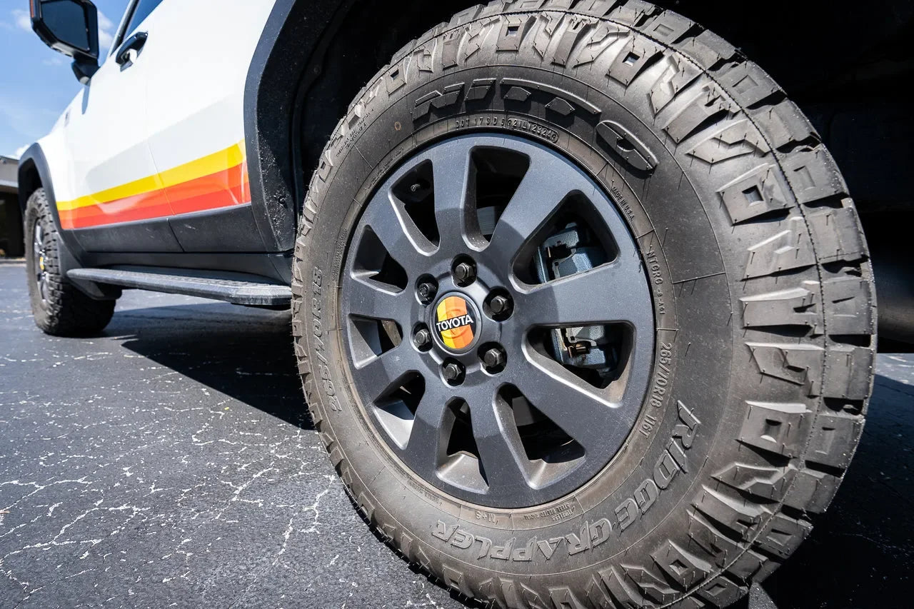 OEM Wheel Cap Overlays - 2024+ Land Cruiser / Tacoma / 2025+ 4Runner - 24LANDCRUISERWC-TYHER-24LANDCRUISERWC-WHBKM-24LANDCRUISERWC-BKM-  DRIVEN - 5