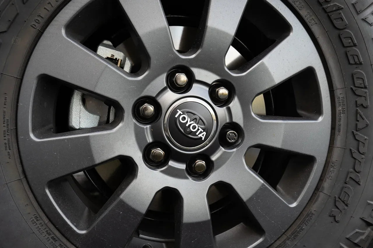 OEM Wheel Cap Overlays - 2024+ Land Cruiser / Tacoma / 2025+ 4Runner - 24LANDCRUISERWC-TYHER-24LANDCRUISERWC-WHBKM-24LANDCRUISERWC-BKM-  DRIVEN - 13