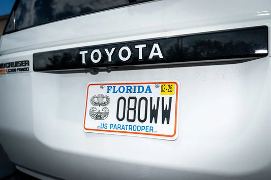 TOYOTA Emergency Reflective Rear Tailgate Emblem Overlays - 2024+ Land Cruiser - 24LC250-RTE-TOYOTA-WH-24LC250-RTE-TOYOTA-MB-24LC250-RTE-TOYOTA-BL-24LC250-RTE-TOYOTA-OR-24LC250-RTE-TOYOTA-PI-  DRIVEN - 1