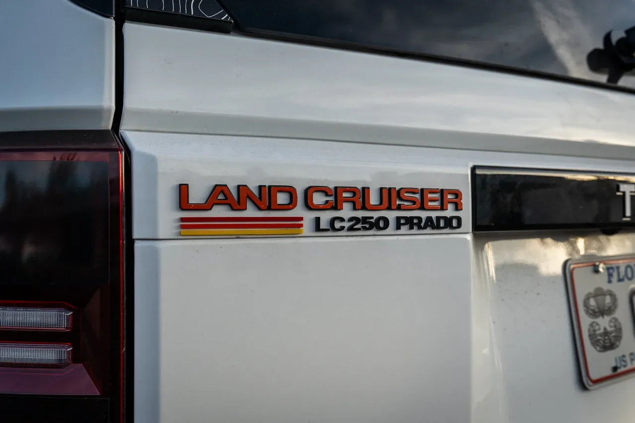 "Land Cruiser" Rear Tailgate Emblem Overlays - 2024+ Land Cruiser - 24LC250-RT-LC-WH-24LC250-RT-LC-MB-24LC250-RT-LC-BL-24LC250-RT-LC-GR-24LC250-RT-LC-OR-  DRIVEN - 3