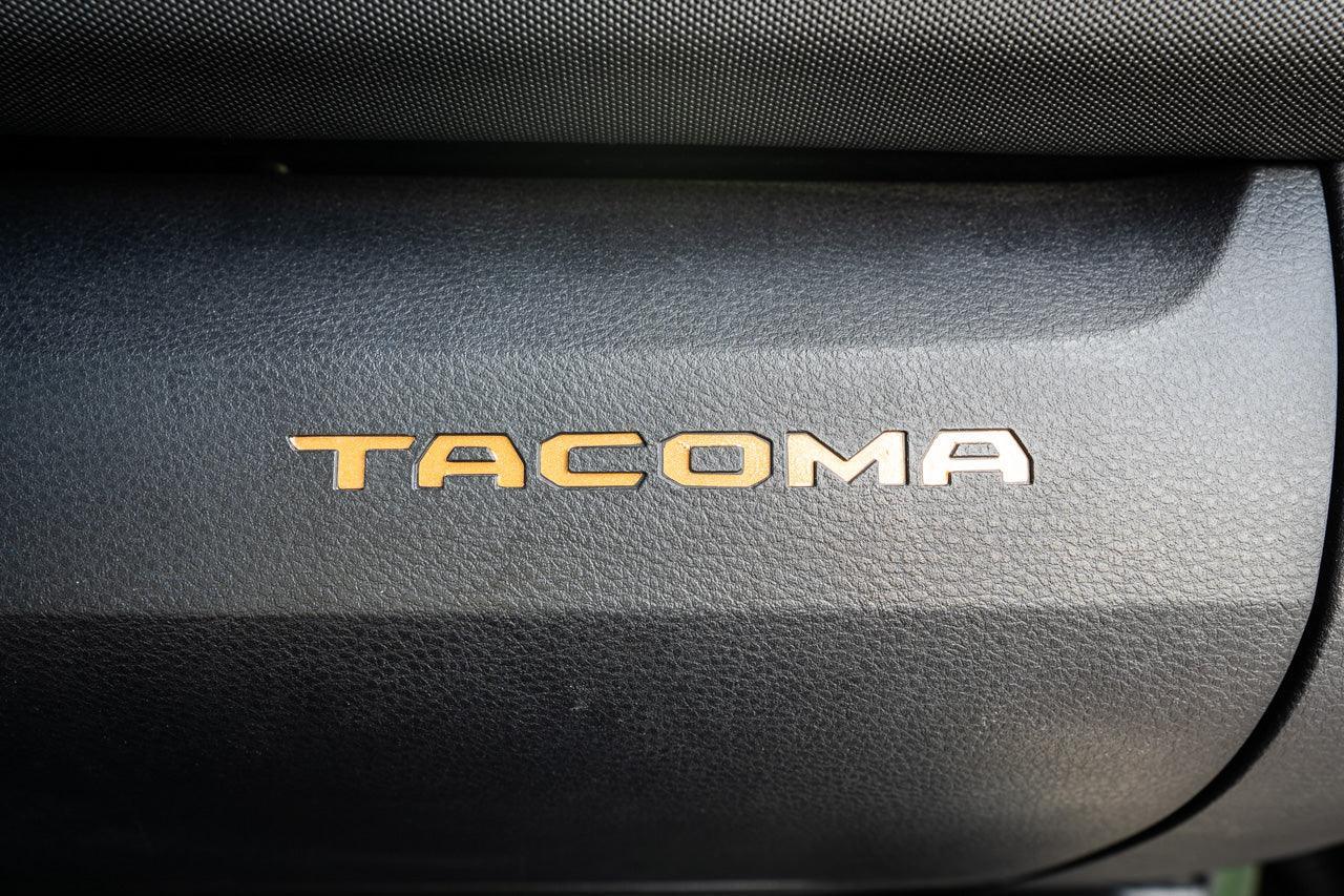 Glove Box "TACOMA" Logo Inlays (Standard Series) - 2016-2023 Tacoma - 16TACOGLOVEINLAY-BO-16TACOGLOVEINLAY-BG-16TACOGLOVEINLAY-RD-16TACOGLOVEINLAY-WH-16TACOGLOVEINLAY-BL-  DRIVEN - 2