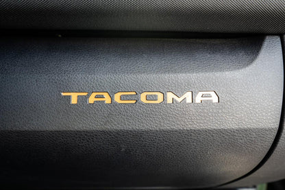 Glove Box "TACOMA" Logo Inlays (Standard Series) - 2016-2023 Tacoma - 16TACOGLOVEINLAY-BO-16TACOGLOVEINLAY-BG-16TACOGLOVEINLAY-RD-16TACOGLOVEINLAY-WH-16TACOGLOVEINLAY-BL-  DRIVEN - 2