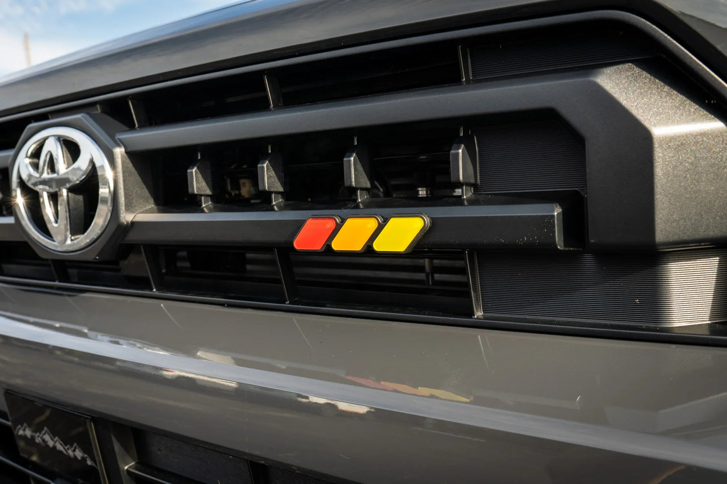 StickerFab Tri Color TRD Style Grille Emblem Version 2- 2024+ Tacoma / 2025+ 4Runner - 254SR5TRIBAR-ORANGE-254SR5TRIBAR-ORANGETP-sku-51541991063871-254SR5TRIBAR-SURFTP-  DRIVEN - 9