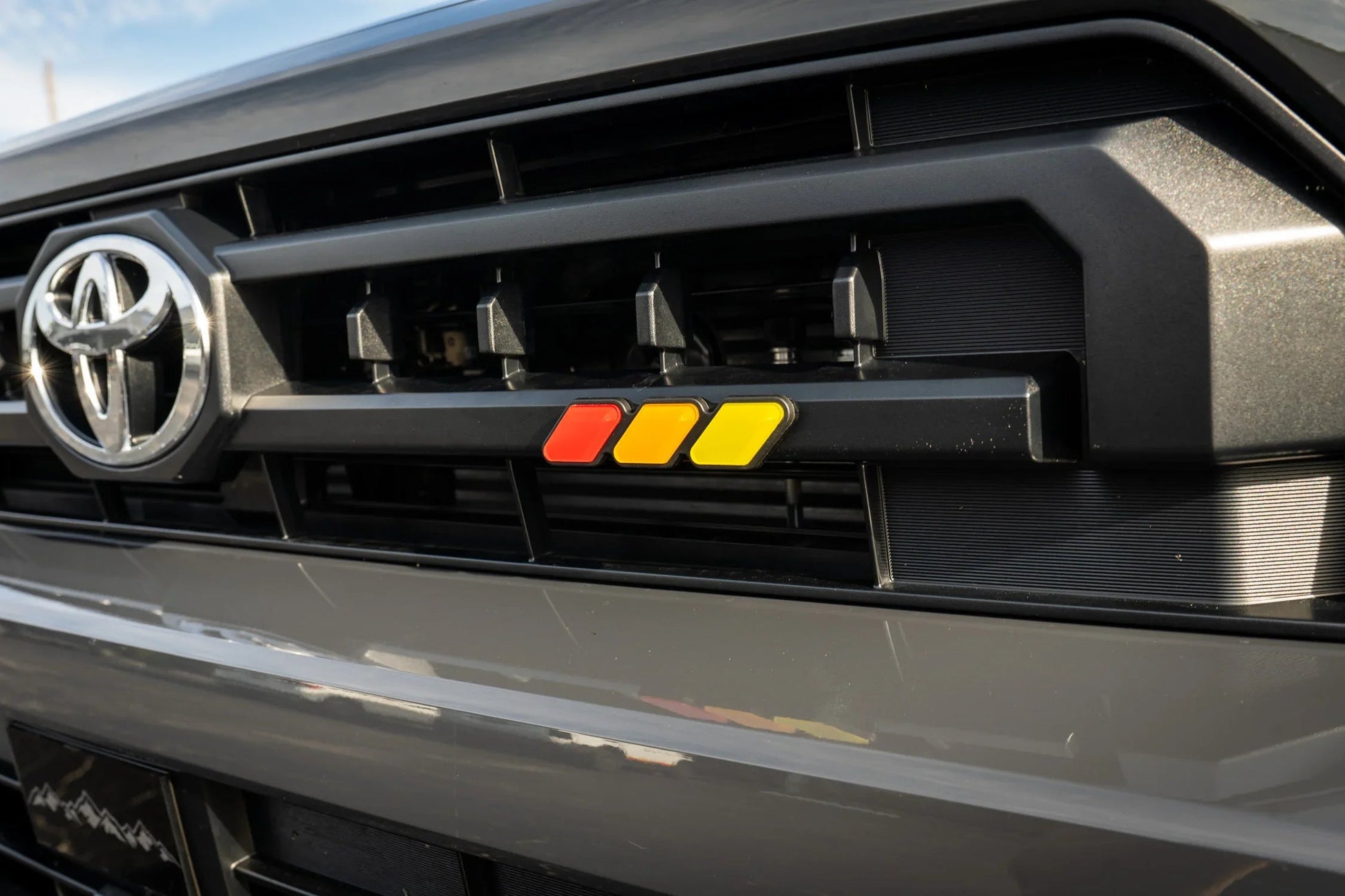 StickerFab Tri Color TRD Style Grille Emblem Version 2- 2024+ Tacoma / 2025+ 4Runner - 254SR5TRIBAR-ORANGE-254SR5TRIBAR-ORANGETP-sku-51541991063871-254SR5TRIBAR-SURFTP-  DRIVEN - 9