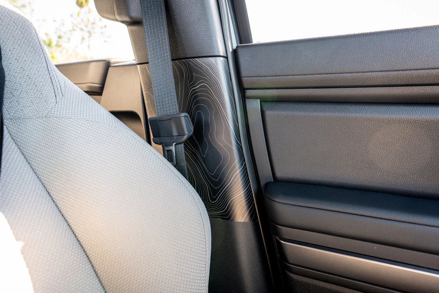 Topographic Seatbelt Panel Protection - 2024+ Tacoma / 2025+ 4Runner - 254RUNNER-SB-TP.WH-254RUNNER-SB-TP.JA-254RUNNER-SB-TP.HB-254RUNNER-SB-TP.VB-254RUNNER-SB-TP.AG-  DRIVEN - 4