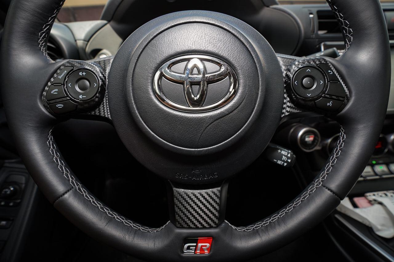 Steering Wheel Controls + Lower Spoke 3D Carbon Overlays - 2022+ BRZ / GR86 - 22BRZSTRCNTLWR-3DB-  DRIVEN - 1