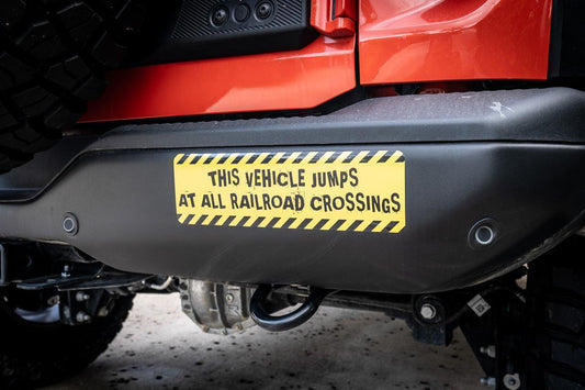 Warning Sticker "This vehicle jumps at all railroad crossings" - Universal - JUMPFUNNY.2-JUMPSERIOUS.1-  DRIVEN - 1